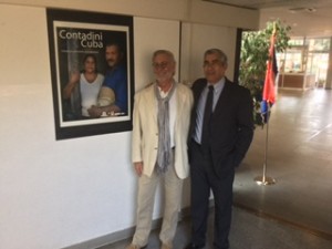 UA photographer Chip Cooper with Cuban photographer Julio Larramendi at their exposition in Rome.